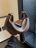 Bolso con forma de media luna de estilo vintage