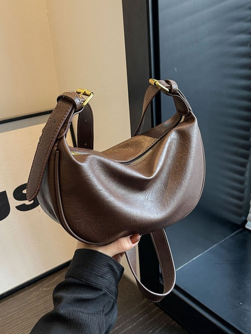 Bolso con forma de media luna de estilo vintage